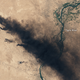 The burning Qayyarah oil field on August 17, 2016.